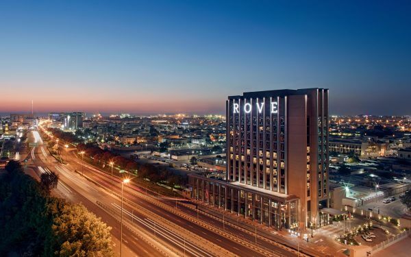 Night exterior view of Rove Trade Centre Hotel in Dubai